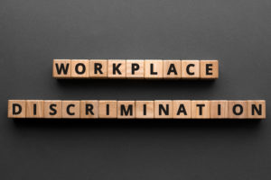 blocks spelling workplace discrimination