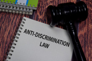 anti-discrimination law notebook with gavel