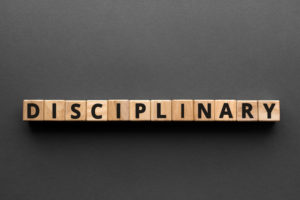 Disciplinary spelled with blocks